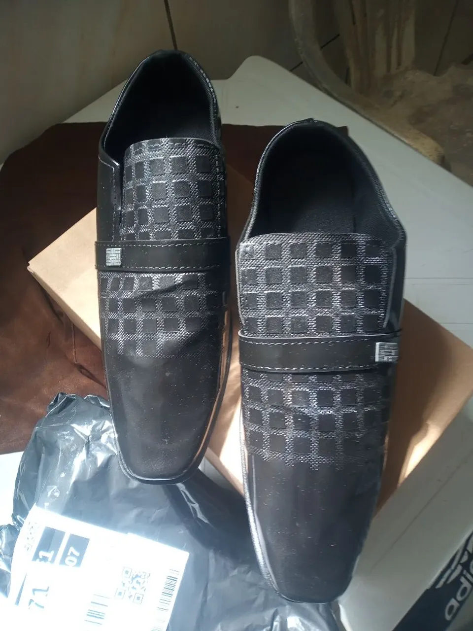 Sapato novo na caixa