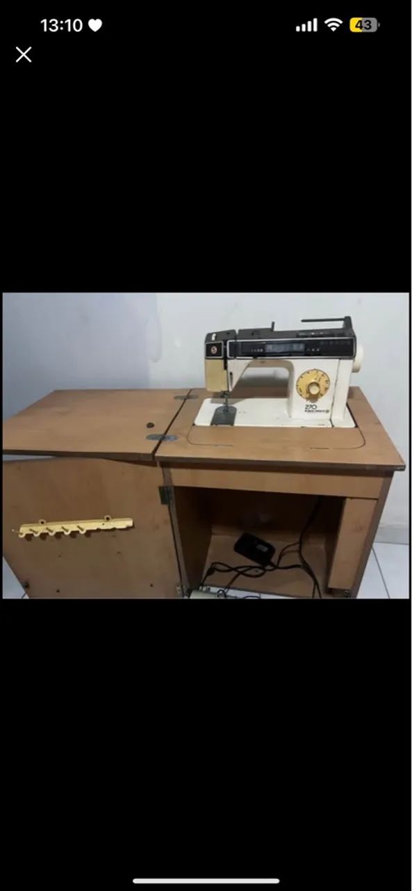 Máquina de Costura Singer modelo 270 bobina mágica com Gabinete