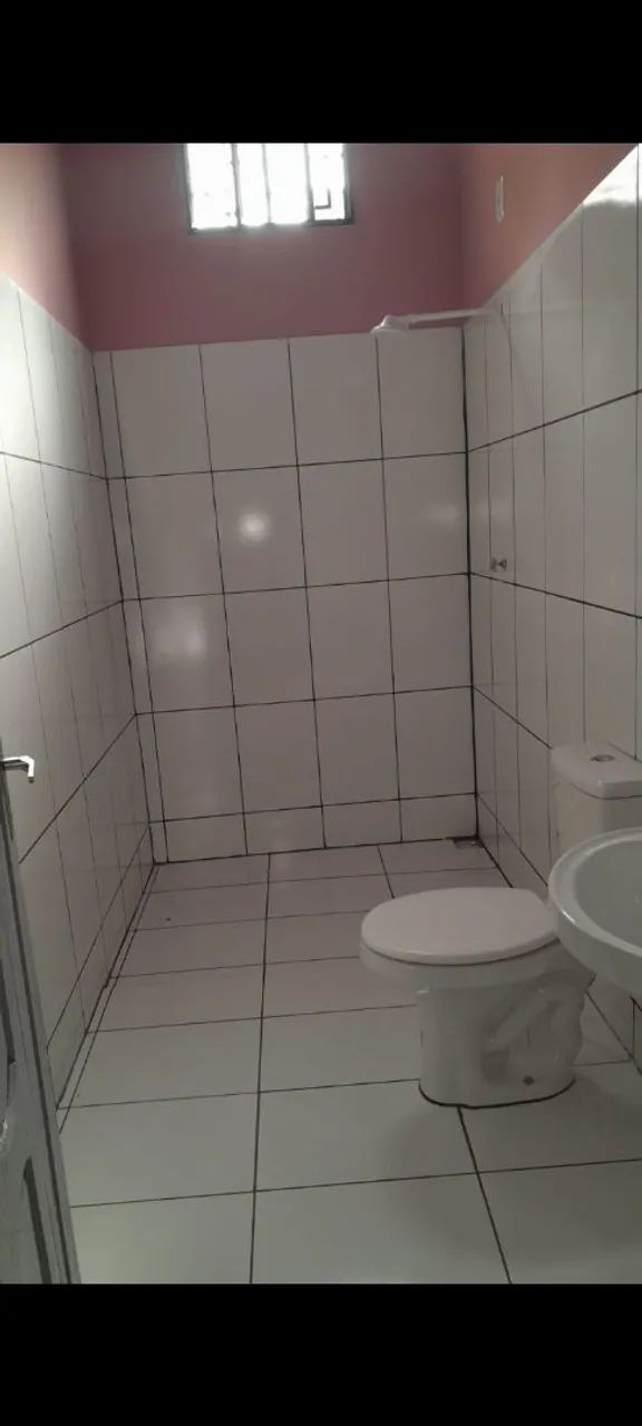 Aluga-se apartamento com dois quartos. Sala cozinha americana.Murado. Portão eletrônico. - Foto 4