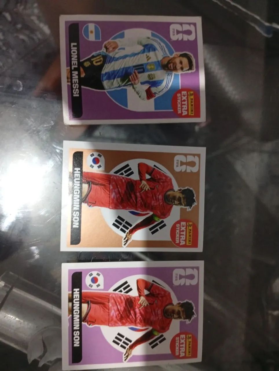 Vendo combo de figurinhas da copo; Lionel Messi,  Heungmin Son,  