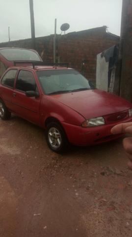 Vendo ou troco p carro.fieta 98.4000