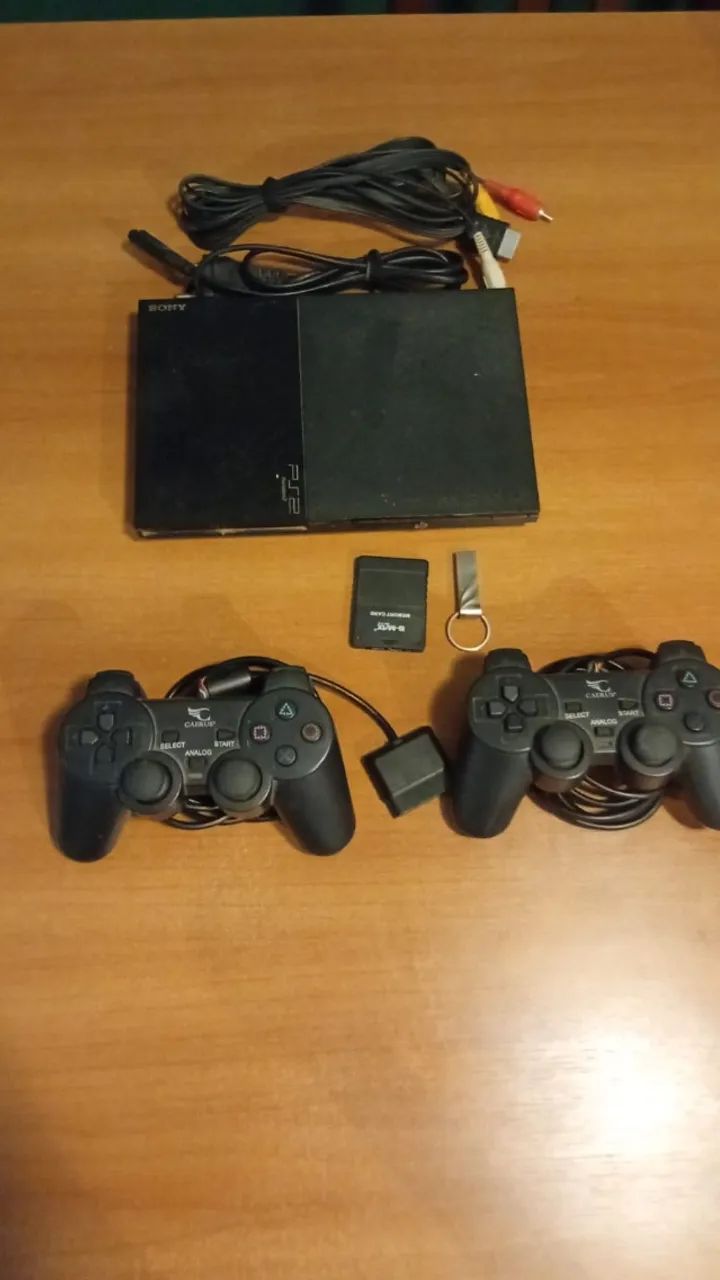 Playstation 2 com 2 controles e pendrive 32gb