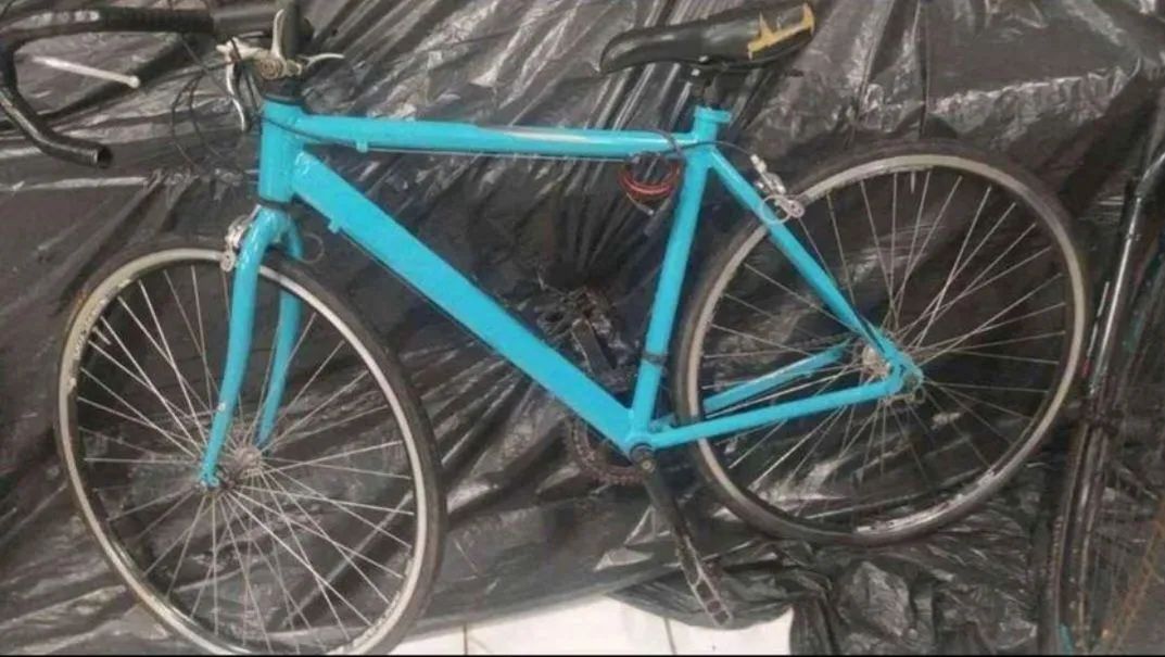 Bicicleta azul caloi corrida.