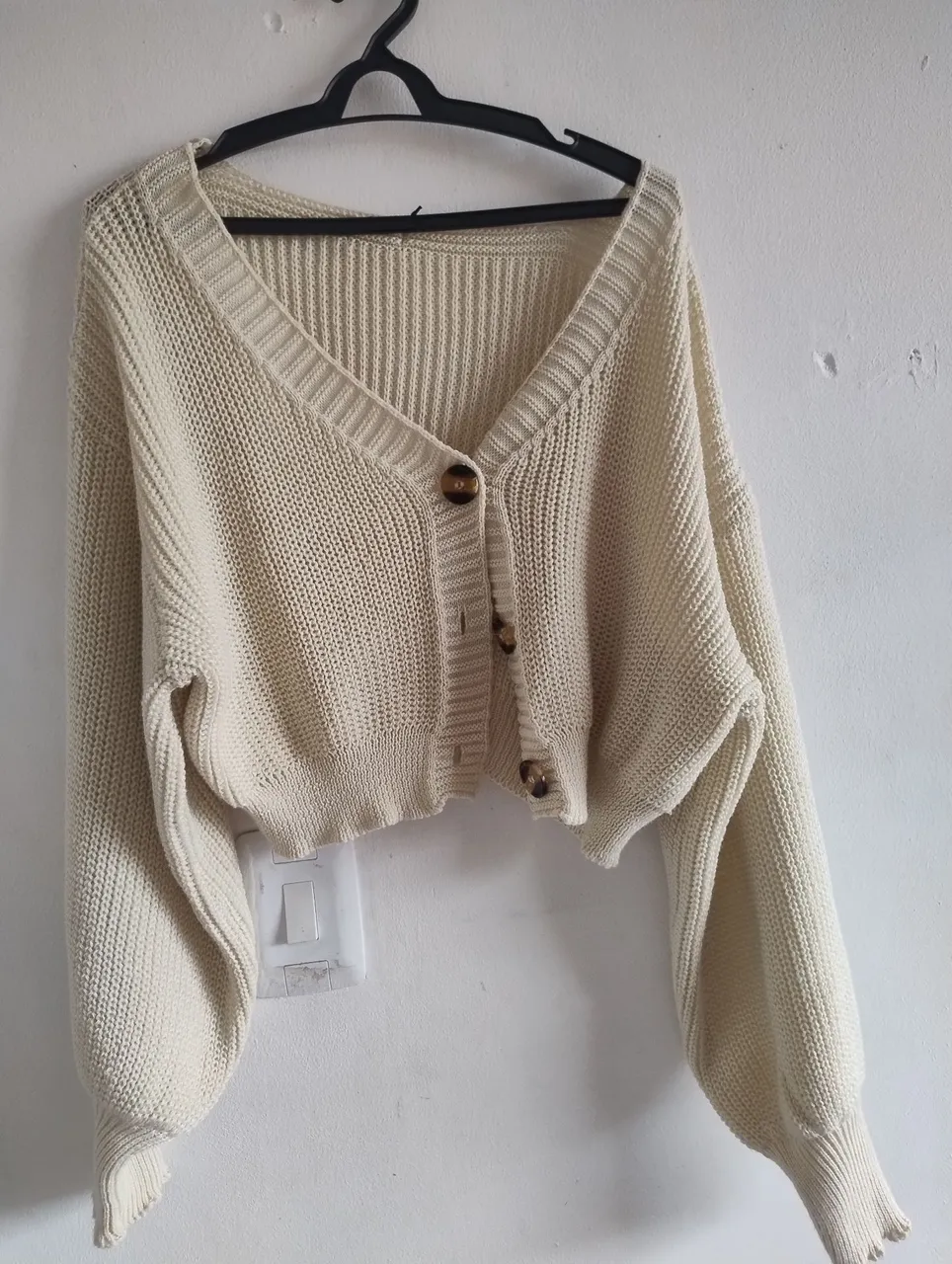 Cardigã feminino de tricô bege