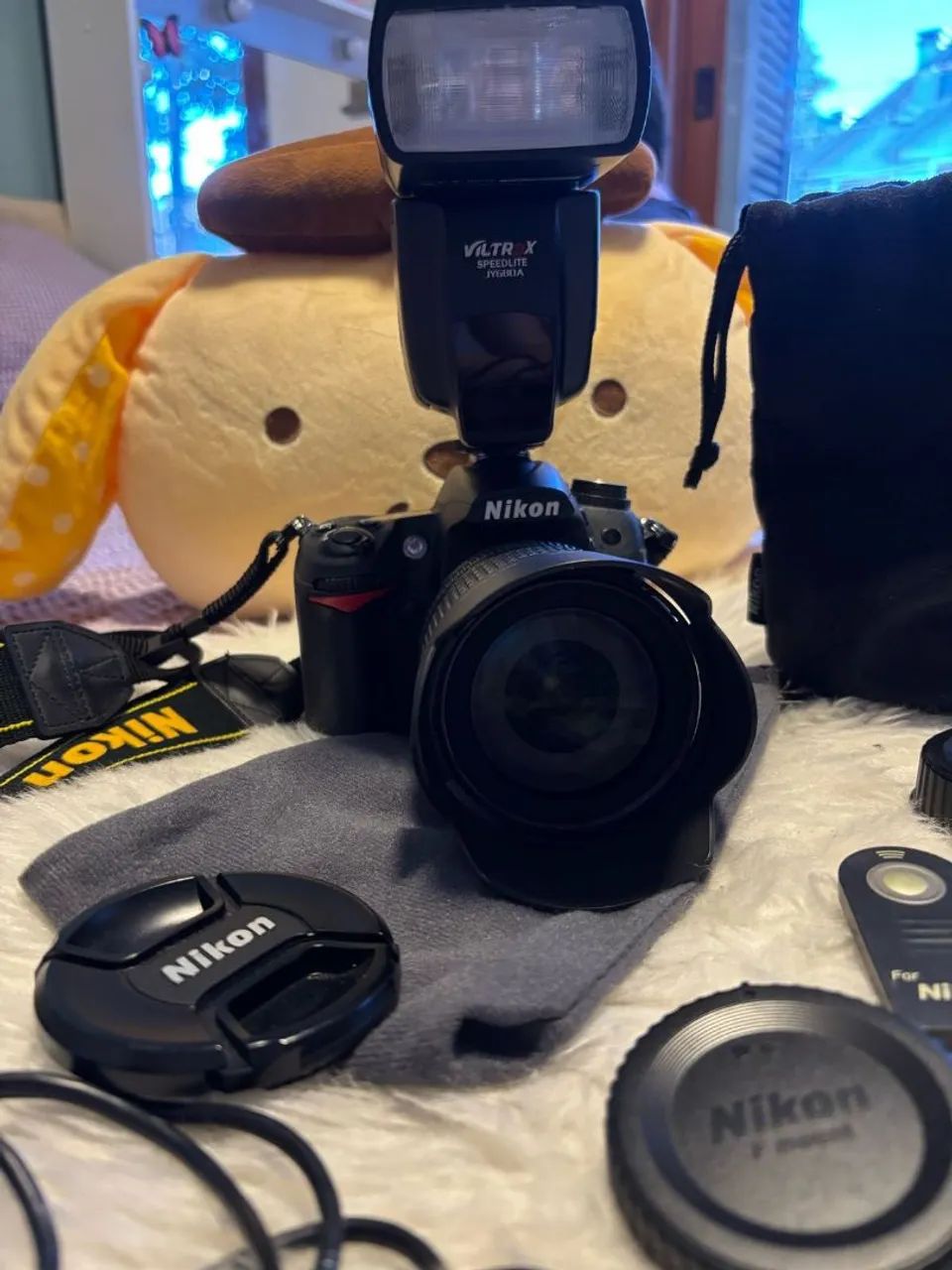 Câmera DSLR Nikon D7000 com Flash Speedlite - Foto 3