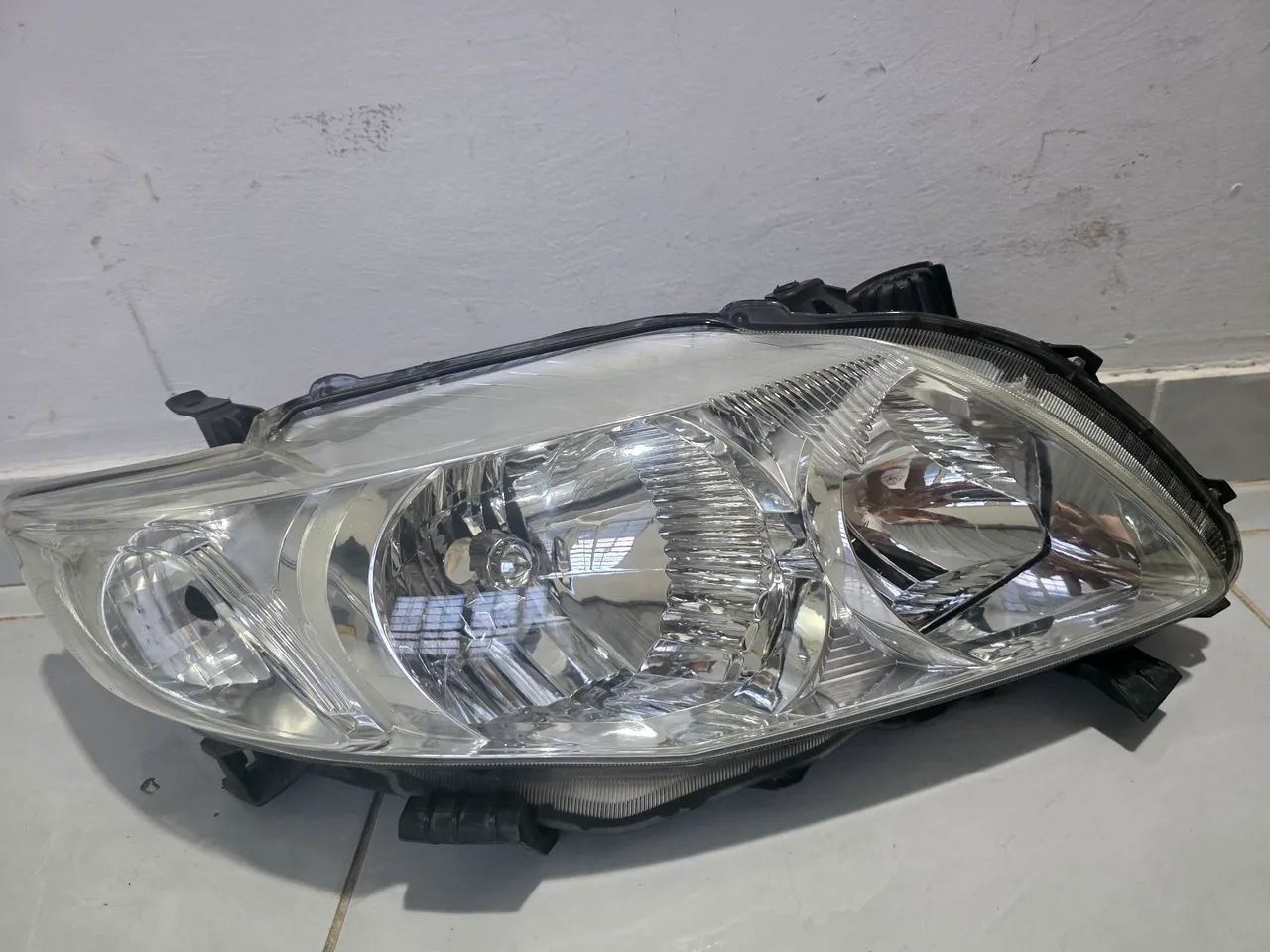 Farol original corolla 2009/2011