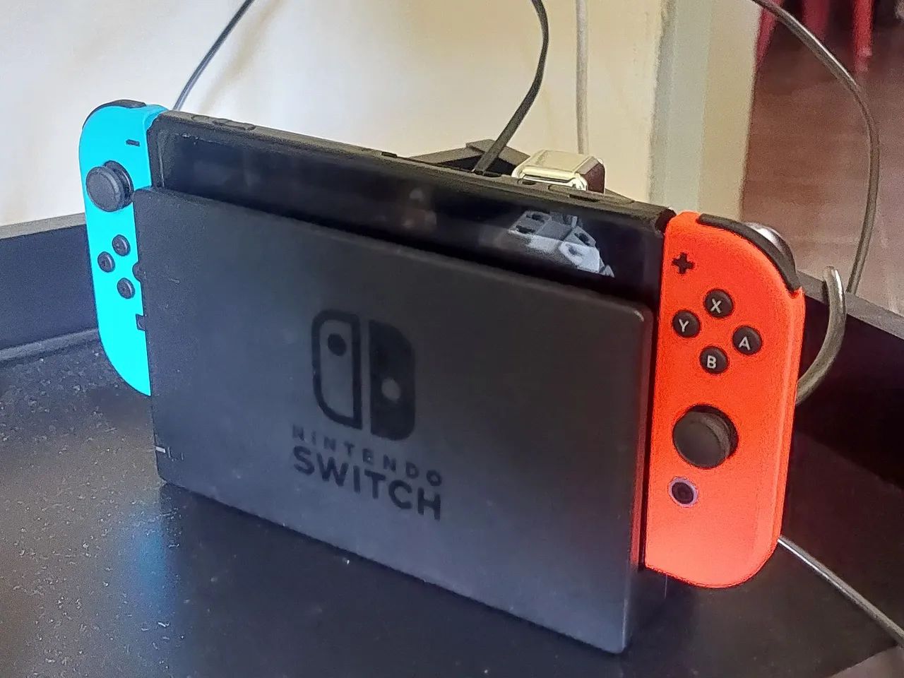 Vendo nintendo switch original com 4 jogos - Foto 2