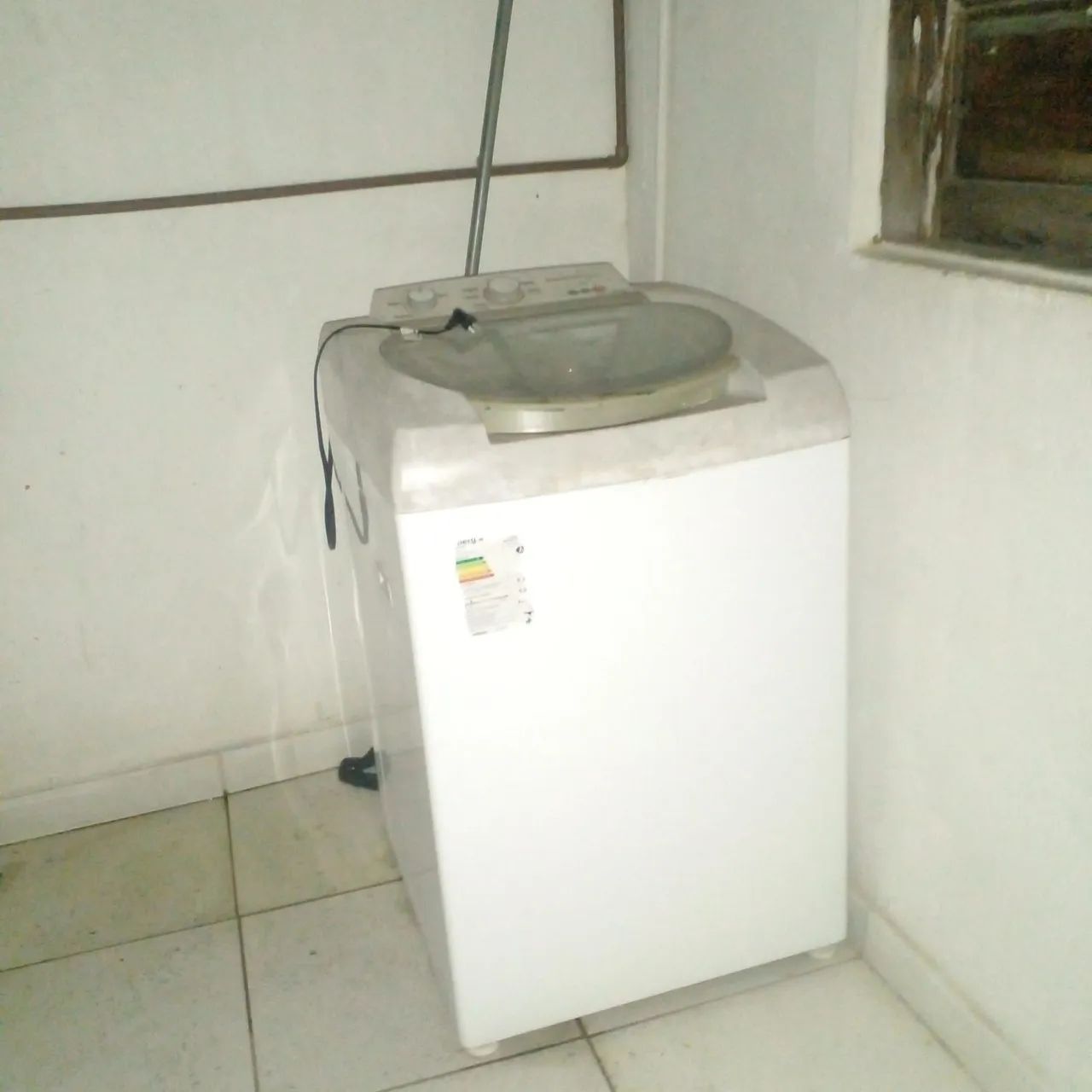 Máquina de lavar com defeito 
