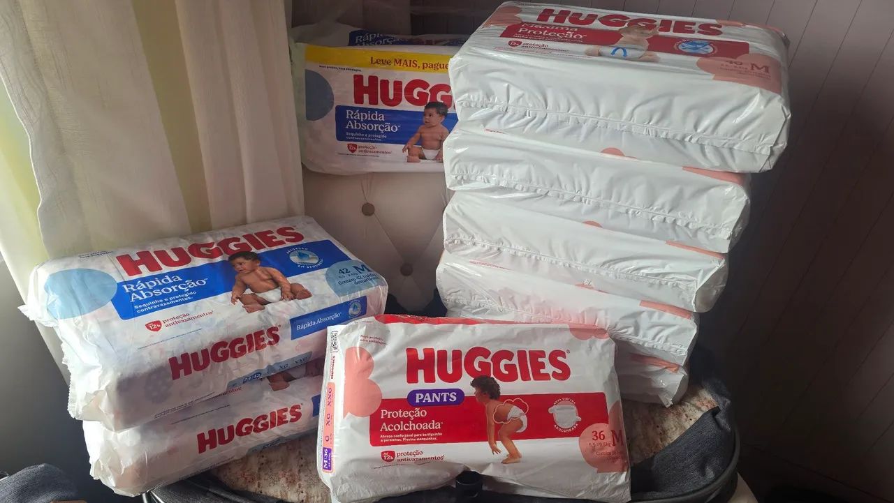 FRALDA HUGGIES TAMANHO M DIVERSAS - ACEITO TROCA