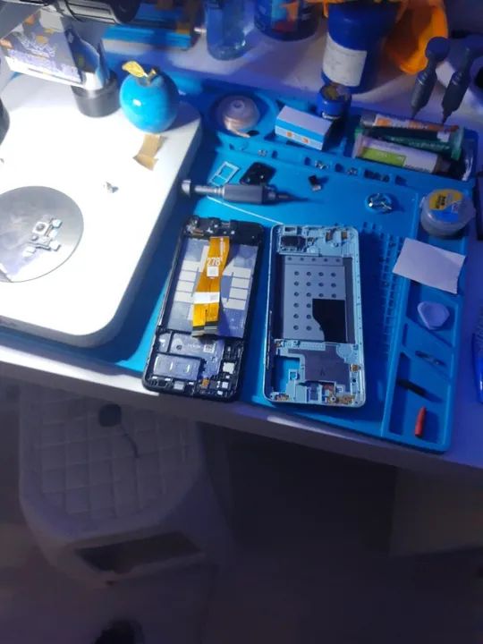 Assistência técnica técnica troca gaveta de chip e bateria 