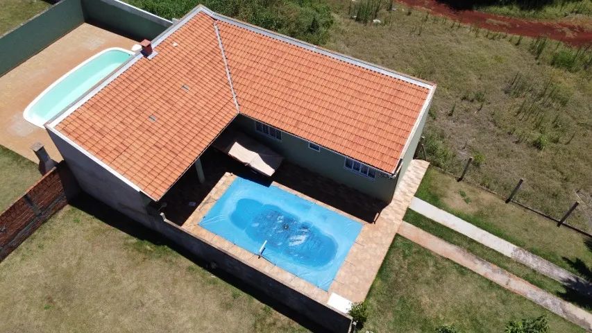 Chacara 500m² com Casa de Alvenaria e Piscina Condomínio Tucunaré em Alvorada do Sul. 