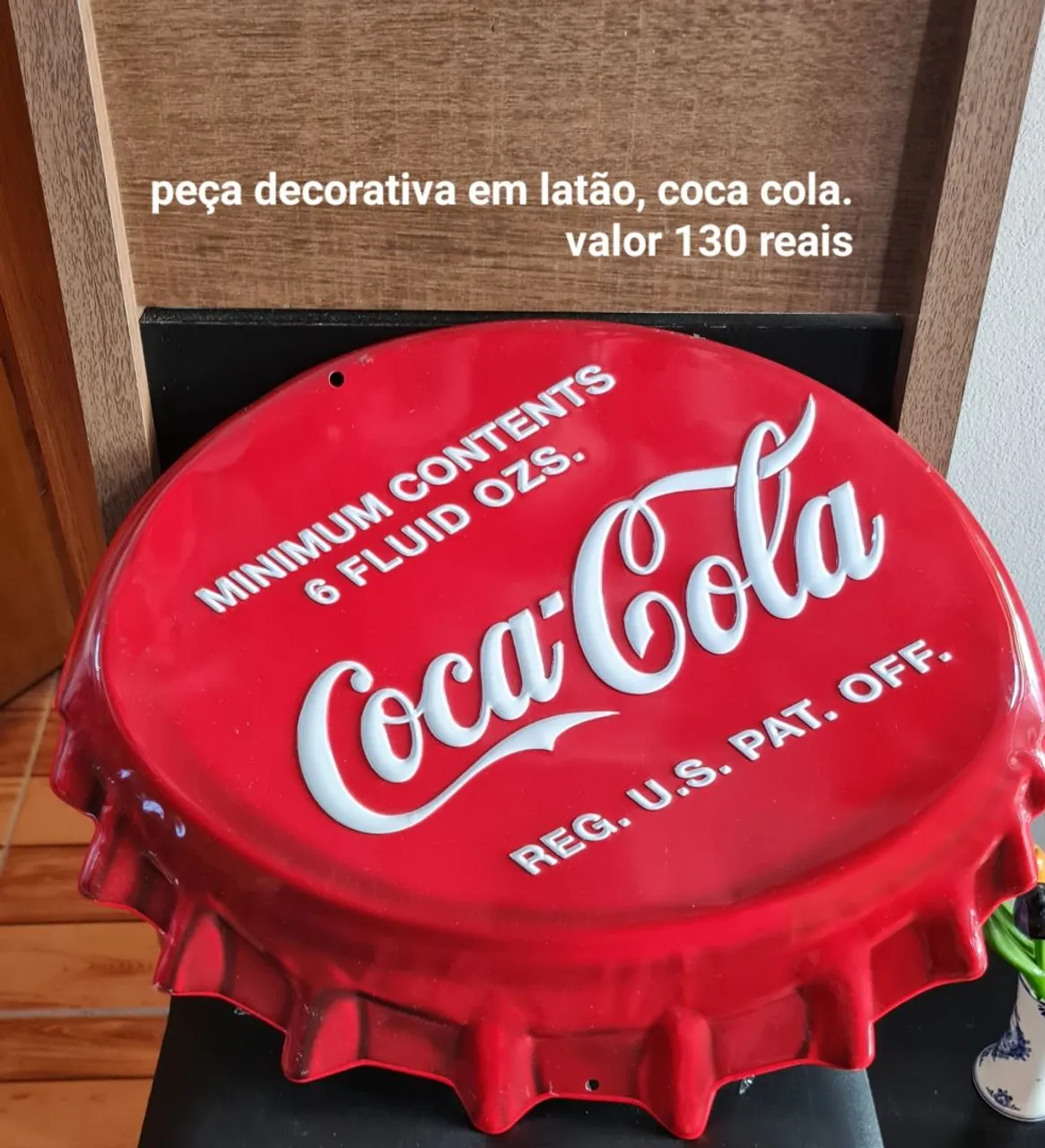 Peça decorativa Coca-Cola em latão