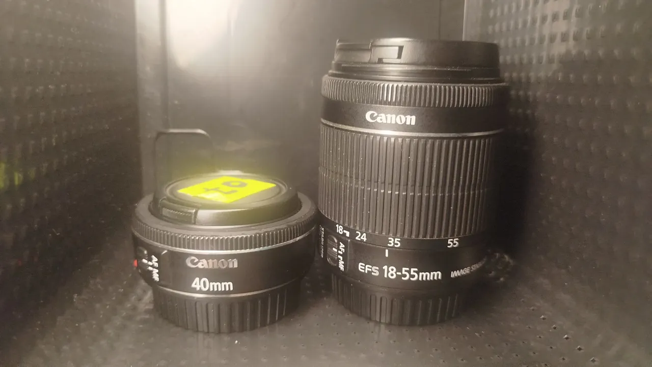 Lentes Canon 40mm e 18-55mm pra vender logo