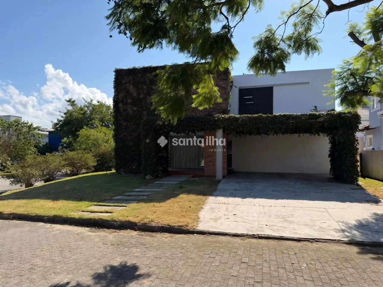 Casa em condomínio com 5 dormitórios para alugar, 268m² - Campeche - Florianópolis/SC