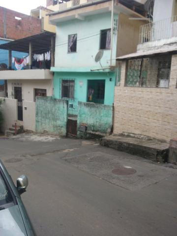 Casa no térreo em frente de rua *