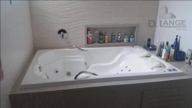 Lindo sobrado com 380m², 4 suítes com ar condicionado, churrasqueira e piscina. - Foto 15