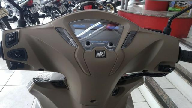 Honda Biz 125 Ex prata zero Km aceitamos troca emplacada - Foto 5