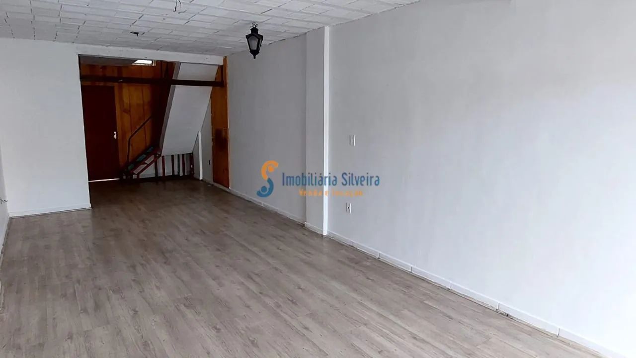 Vendo loja com mezanino na Av. Cristiano Machado ;