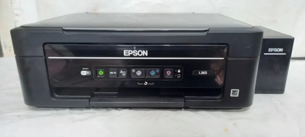 impressora epson L365 de tanque funcionando vê fotos só o amarelo com falhas