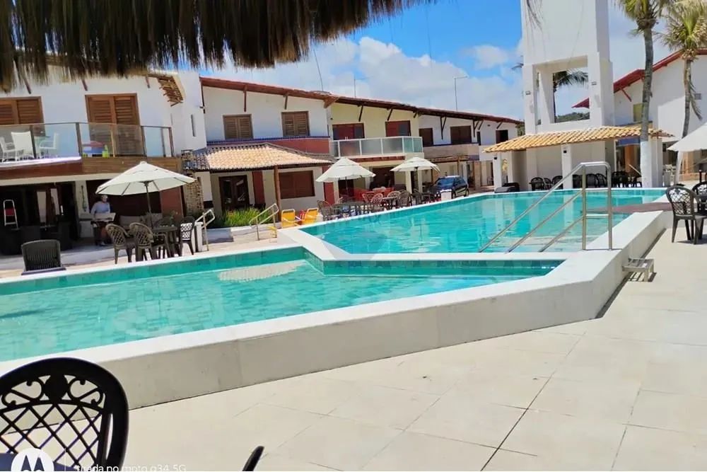 "Casa de Luxo na Praia: Conforto e Sofisticação" - Foto 5