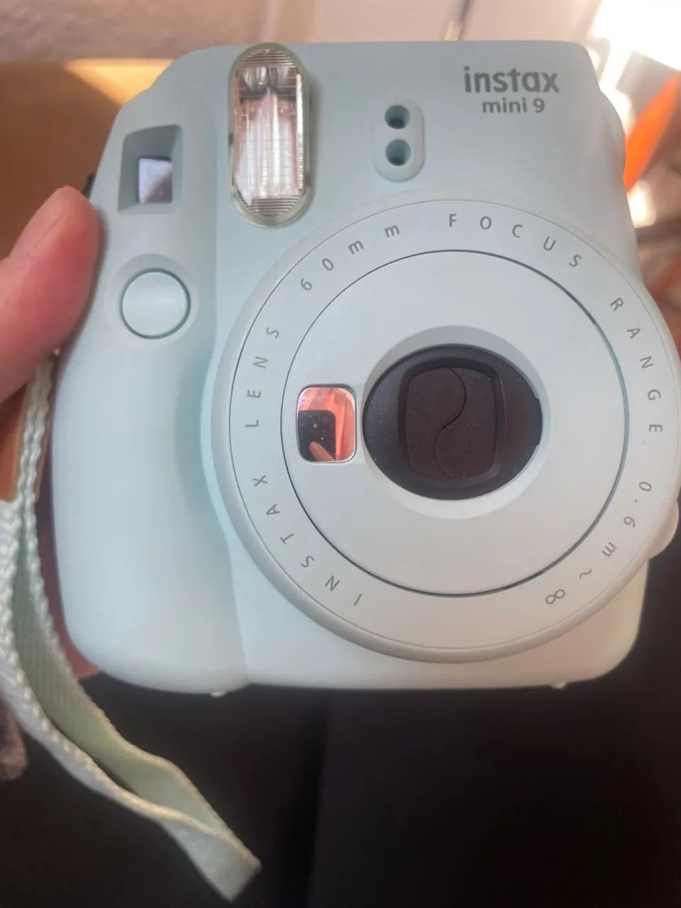 Câmera Instax Mini 9 - Fotos instantâneas e divertidas!