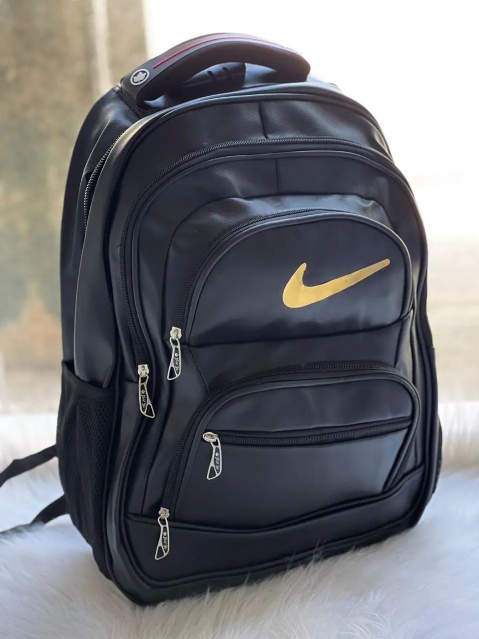 Mochila de couro sintético 
