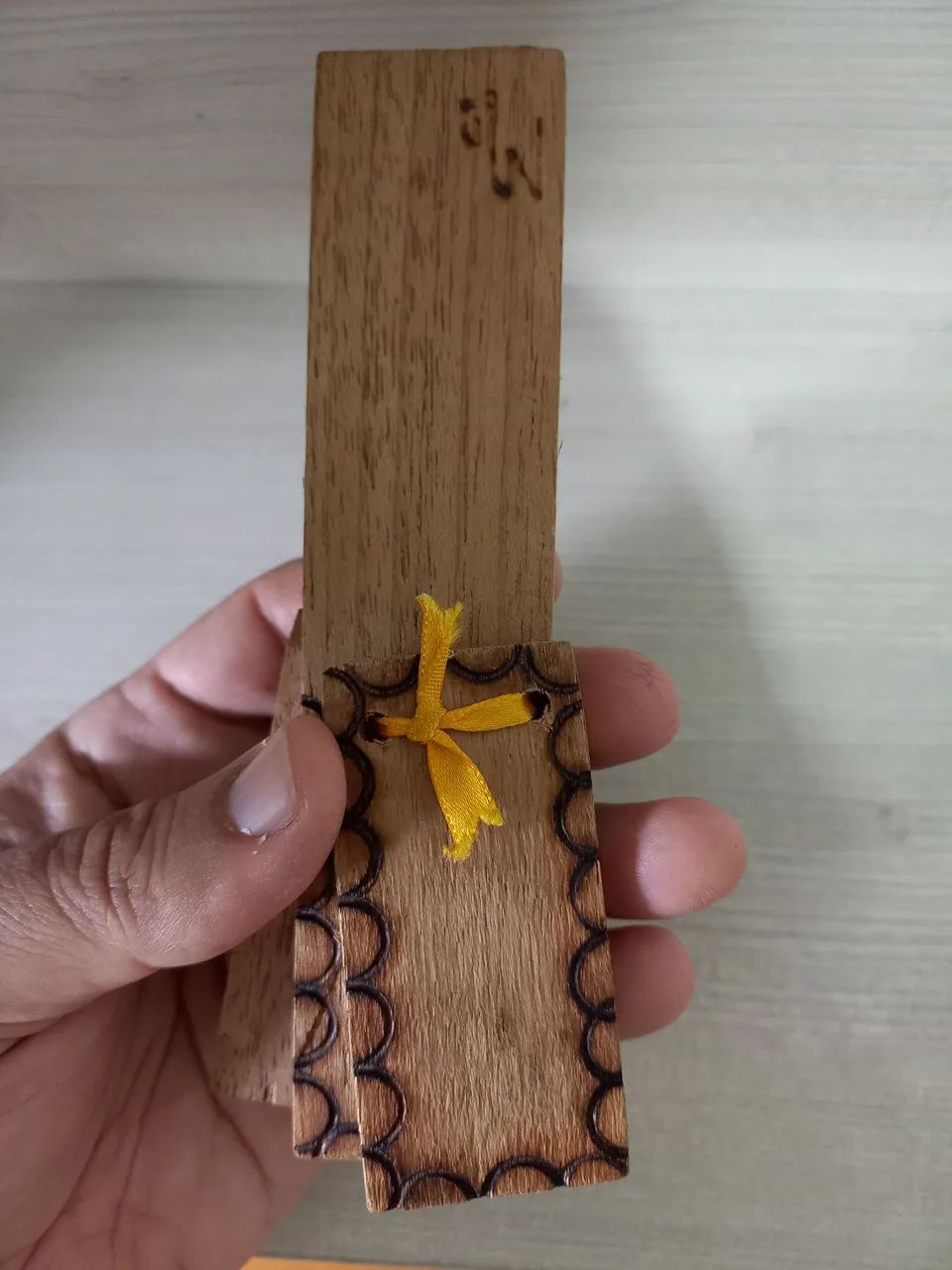 Castanholas de madeira com cabo