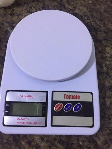 Vendo balança semi nova a pilha 20 reais - Foto 2
