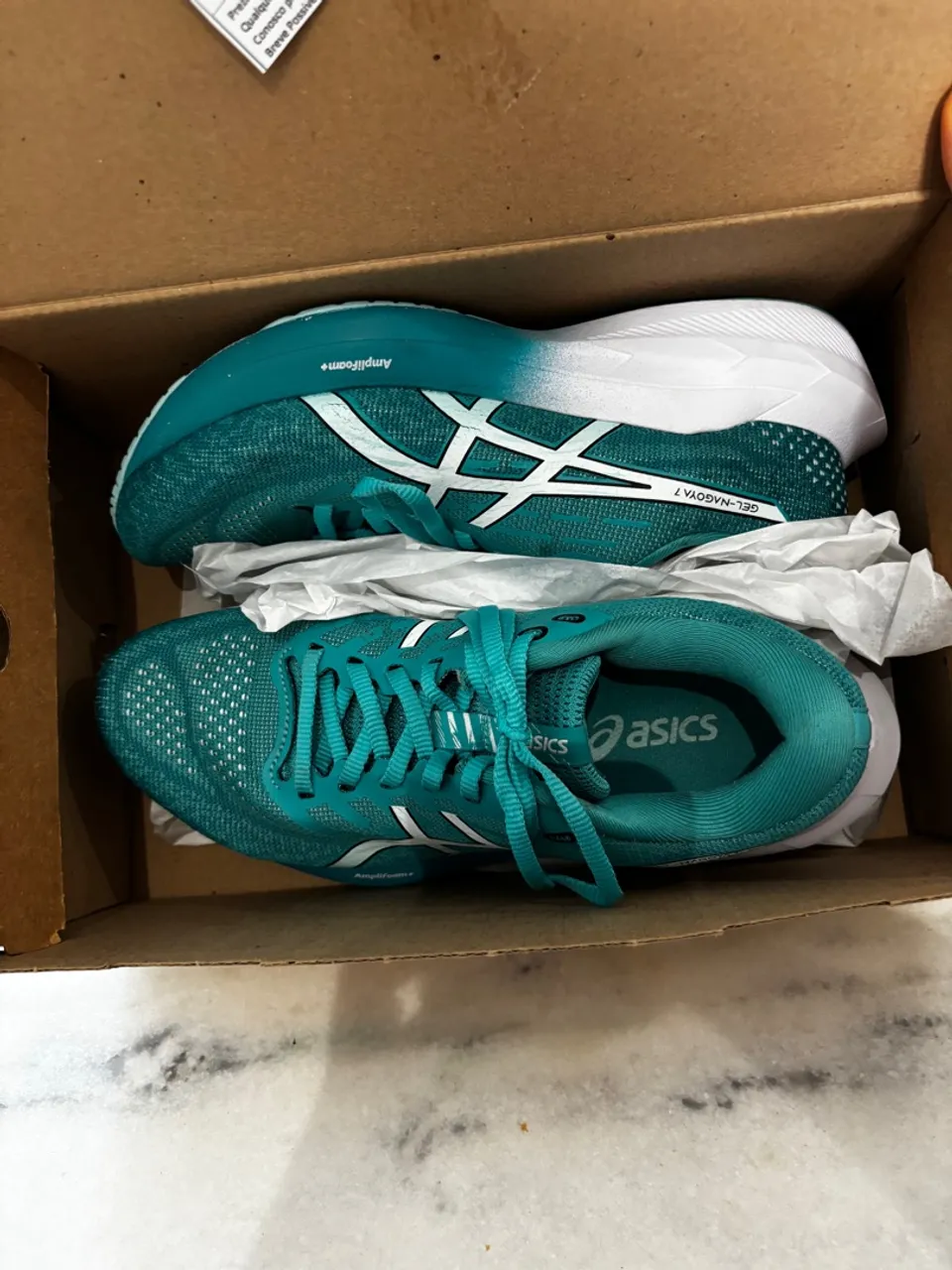 Tênis de corrida Asics estado de zero