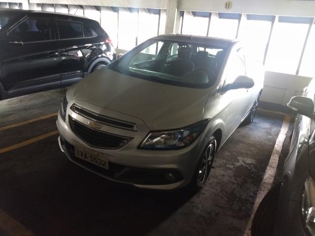 Chevrolet onix em perfeito estado, 4 pneus novos, único dono, nunca foi batido pago - Foto 4