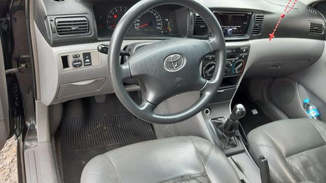 Corolla Preto 2004 1.8 mecanico XEI bancos de couro - Foto 6