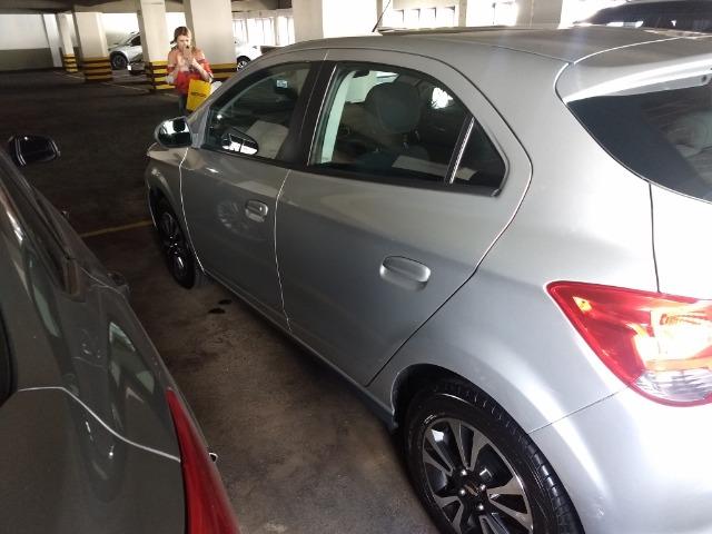 Chevrolet onix em perfeito estado, 4 pneus novos, único dono, nunca foi batido pago - Foto 2