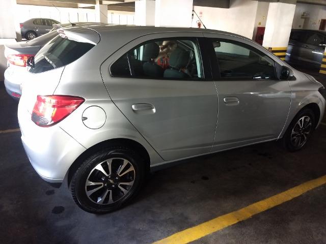 Chevrolet onix em perfeito estado, 4 pneus novos, único dono, nunca foi batido pago