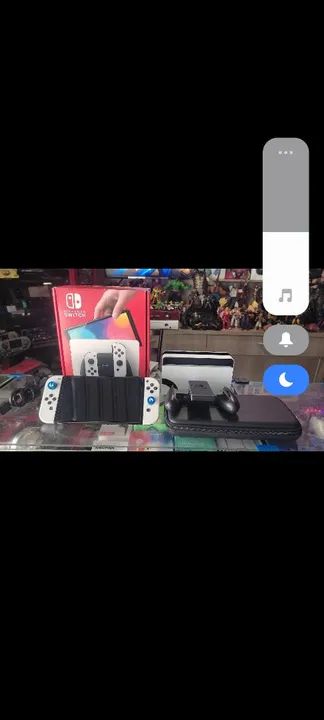 Nintendo Switch 64gb  lotado d jgs impecável semi Novo completo na cx ac trocas... - Foto 2