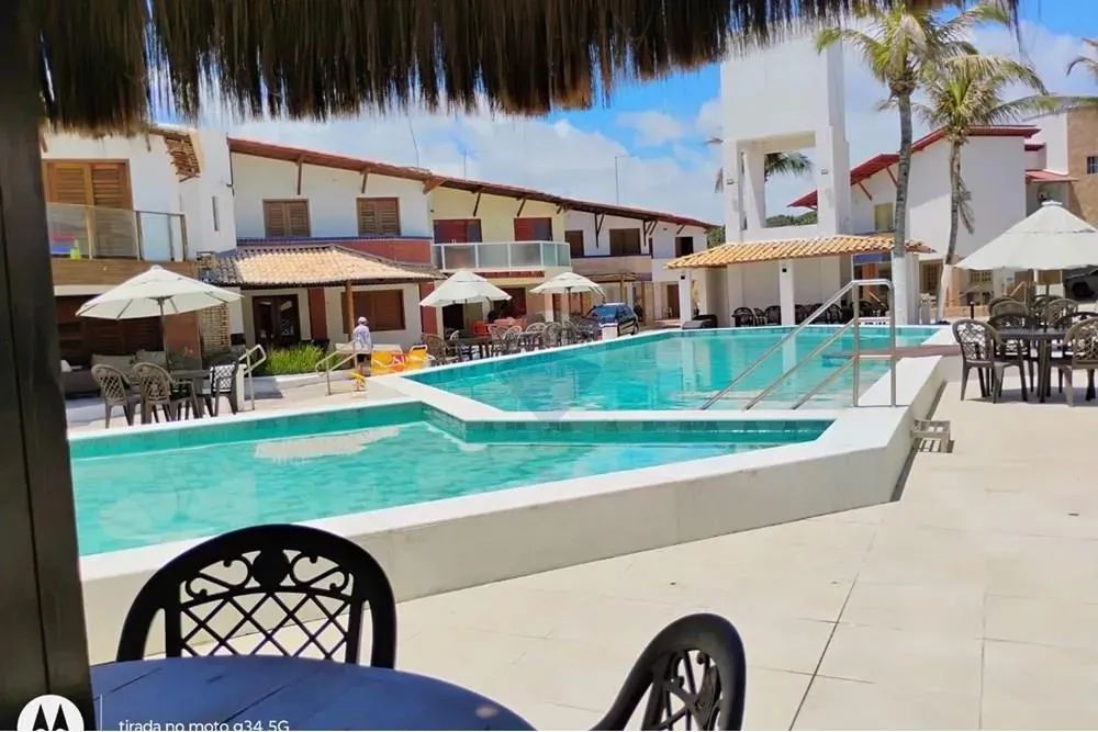 "Casa de Luxo na Praia: Conforto e Sofisticação" - Foto 4