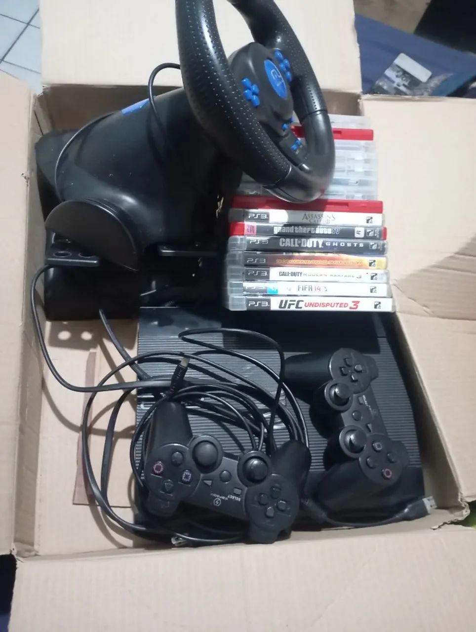 PS3,COM 2 CONTROLES,15 JOGOS,E VOLENTE DE JOGOS DE CORRIDAS