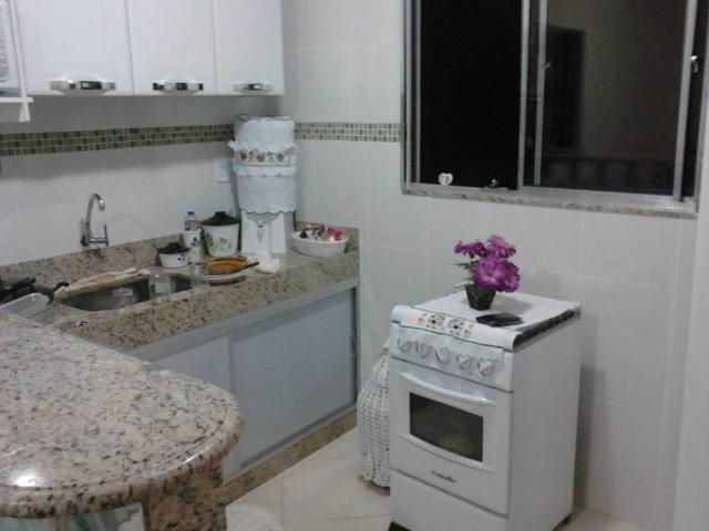 Excelente Oportunidade, 3 andares mais quintal! - Foto 5