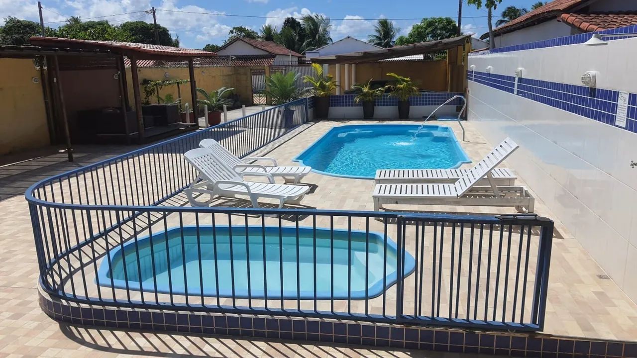 Casa com piscina e 10 suítes para temporada