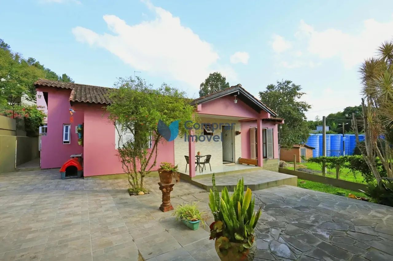 Casa no Condomínio Cantegril - Viamão/RS com com 3 quartos, churrasqueira e 5 v