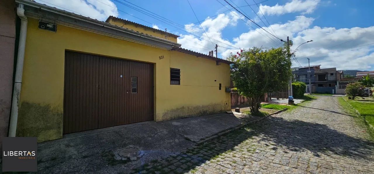 Casa no bairro Restinga - 3 dormitórios
