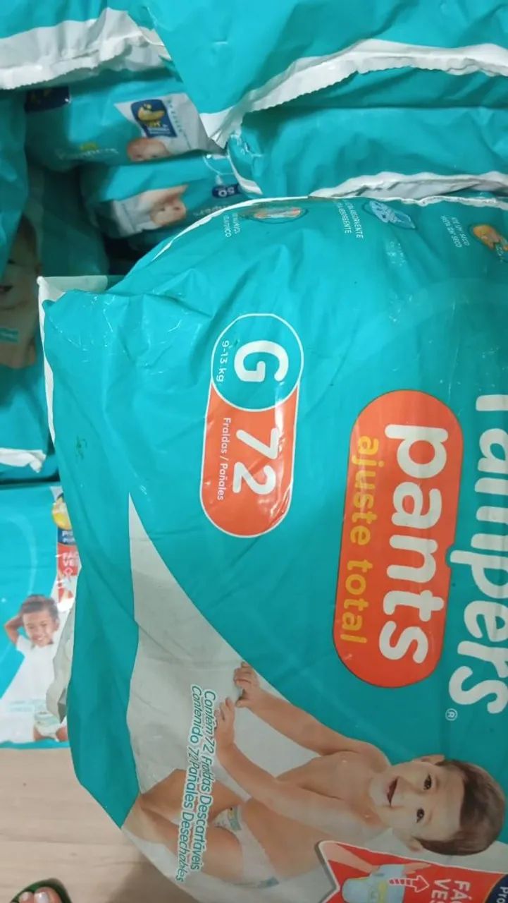 Fraldas Pampers com embalagem danificada  - Foto 4