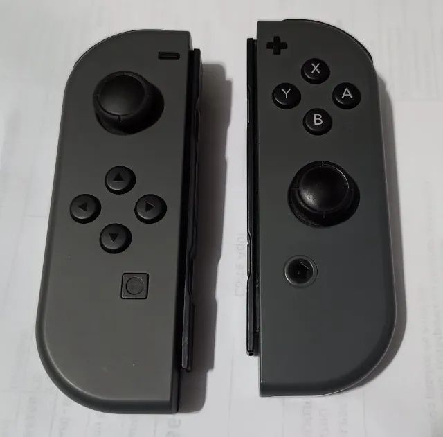 Joy Con direito Nintendo Switch cinza e esquerdo brinde joycon joy-cons controle pro
