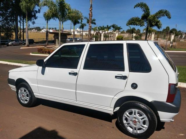 Fiat Uno Mille Celeb Econ 4P Completa - Sem Débitos - Foto 4