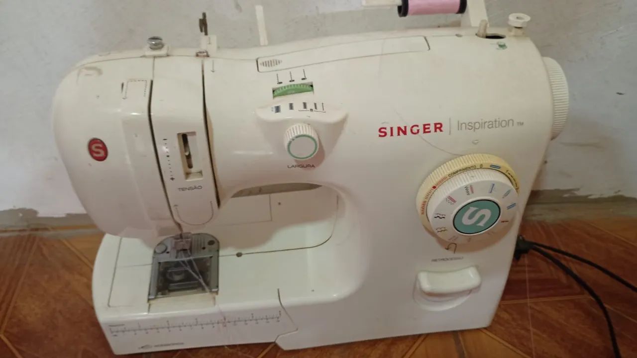 Máquina de costura64169209483906123