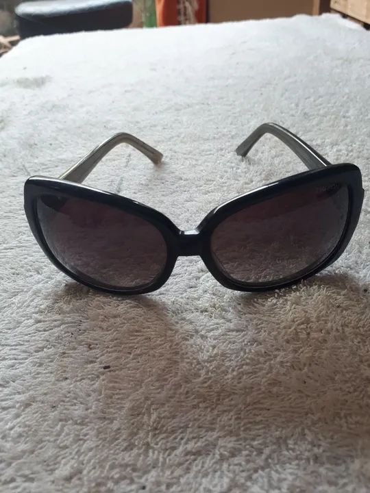 Óculos Triton feminino pouco usado