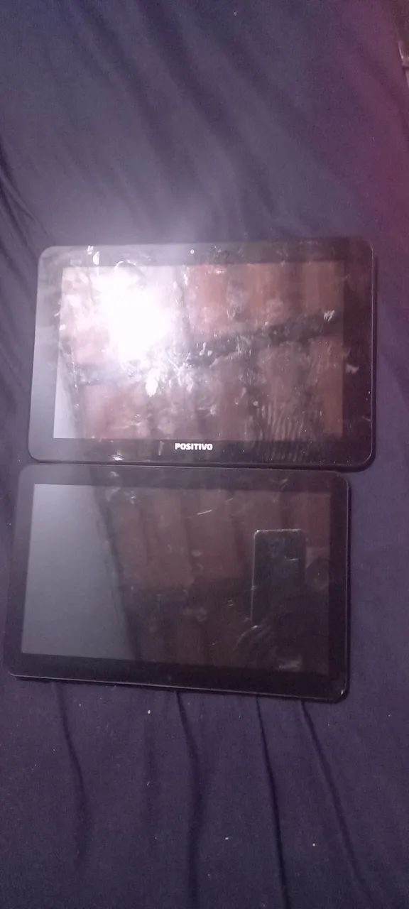 2 tablet.  Pra arrumar ou tirar peças 