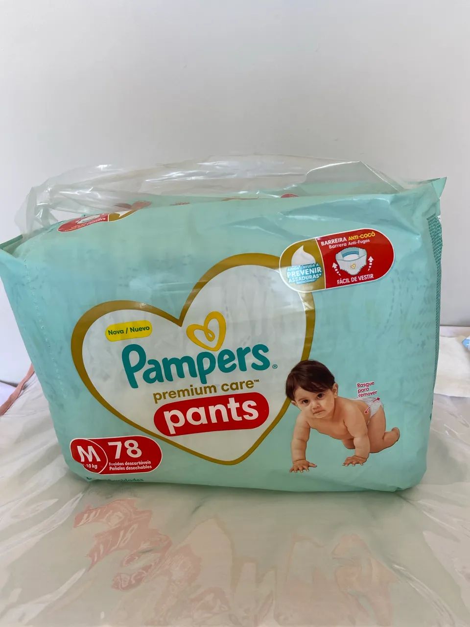 Fralda Pampers premium care pants M