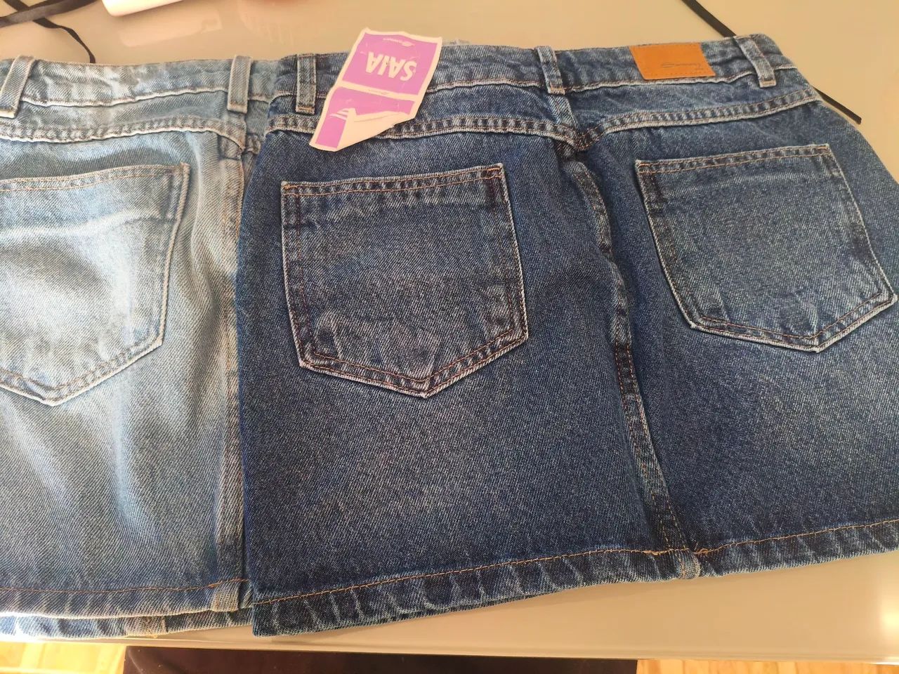 Saias jeans Tam 36 veste 36/38 