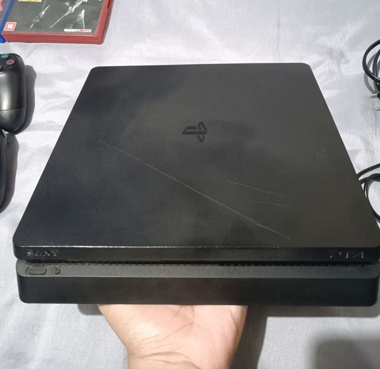 Playstation 4 com 2 controles + 2 jogos - Foto 2