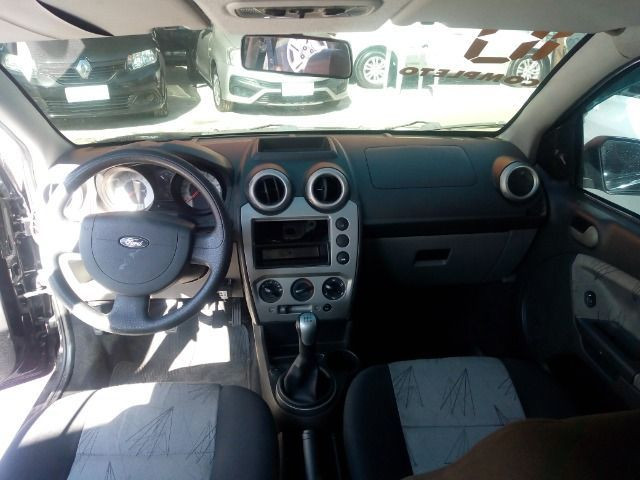 Ford Fiesta Hatch compl + Gnv + 48 X 390,00 Primeira parcela por conta da loja - Foto 7